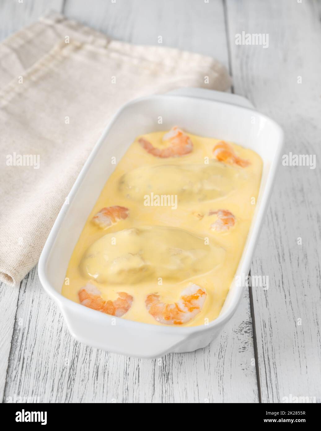 Quenelle con salsa olandese Foto Stock