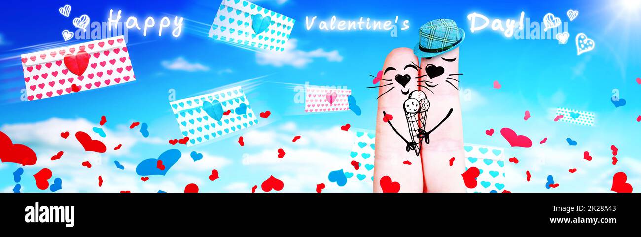 Felice dito giovane in amore per celebrare il giorno di San Valentino Foto Stock