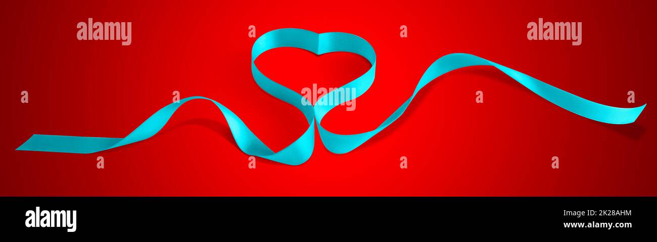 Buon San Valentino. Elegante nastro a forma di cuore. Simbolo dell'amore. Foto Stock