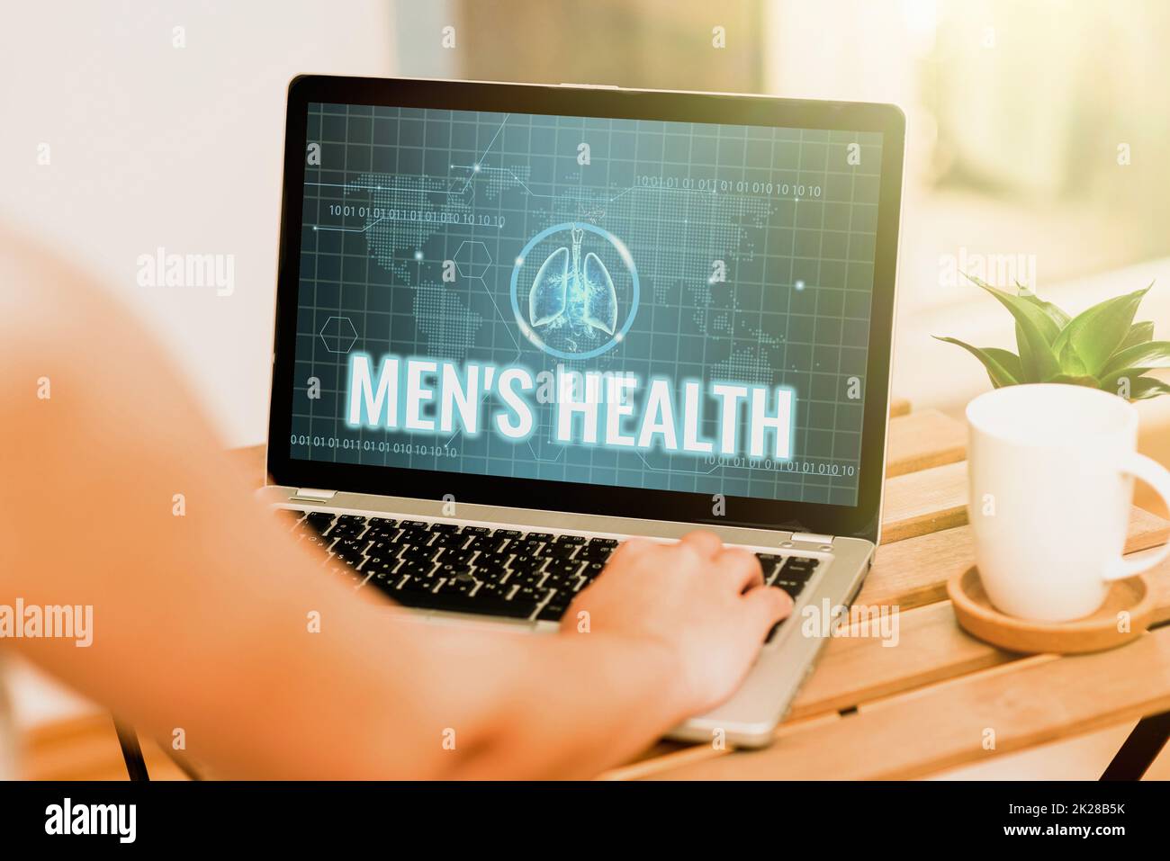 Segno di testo che mostra la salute degli uomini. Panoramica aziendale uomini s è stato di completo benessere fisico, mentale e sociale digitazione a mano sul laptop accanto a Coffe Mug e impianto di lavoro da casa. Foto Stock