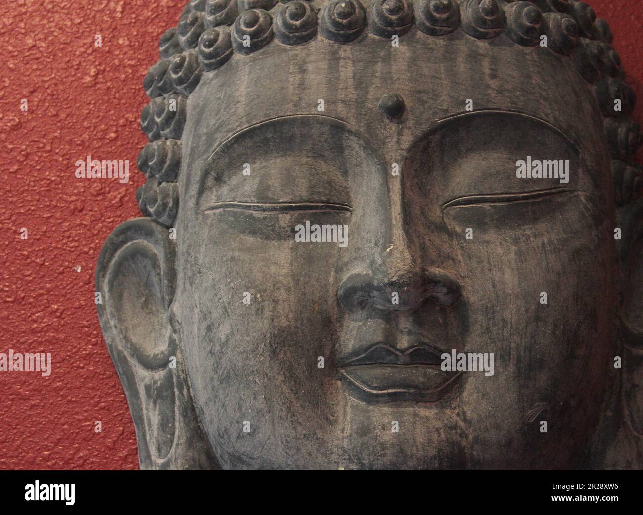 Antica statua del Buddha nel Tempio faccia ravvicinata Foto Stock Antica statua del Buddha nel Tempio faccia ravvicinata Foto Stock