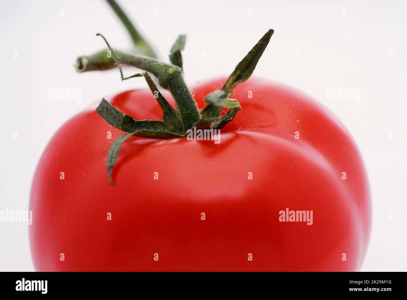 Foto di pomodori rossi come gustoso vegetale Foto Stock