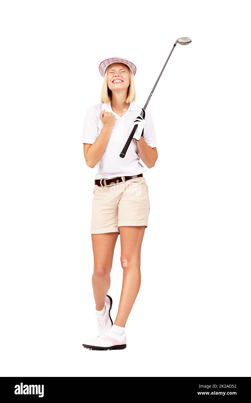 Sì, sapevo che potevo fare questo putt. Full length studio shot di un attraente golfista femmina che celebra un grande scatto isolato su bianco. Foto Stock