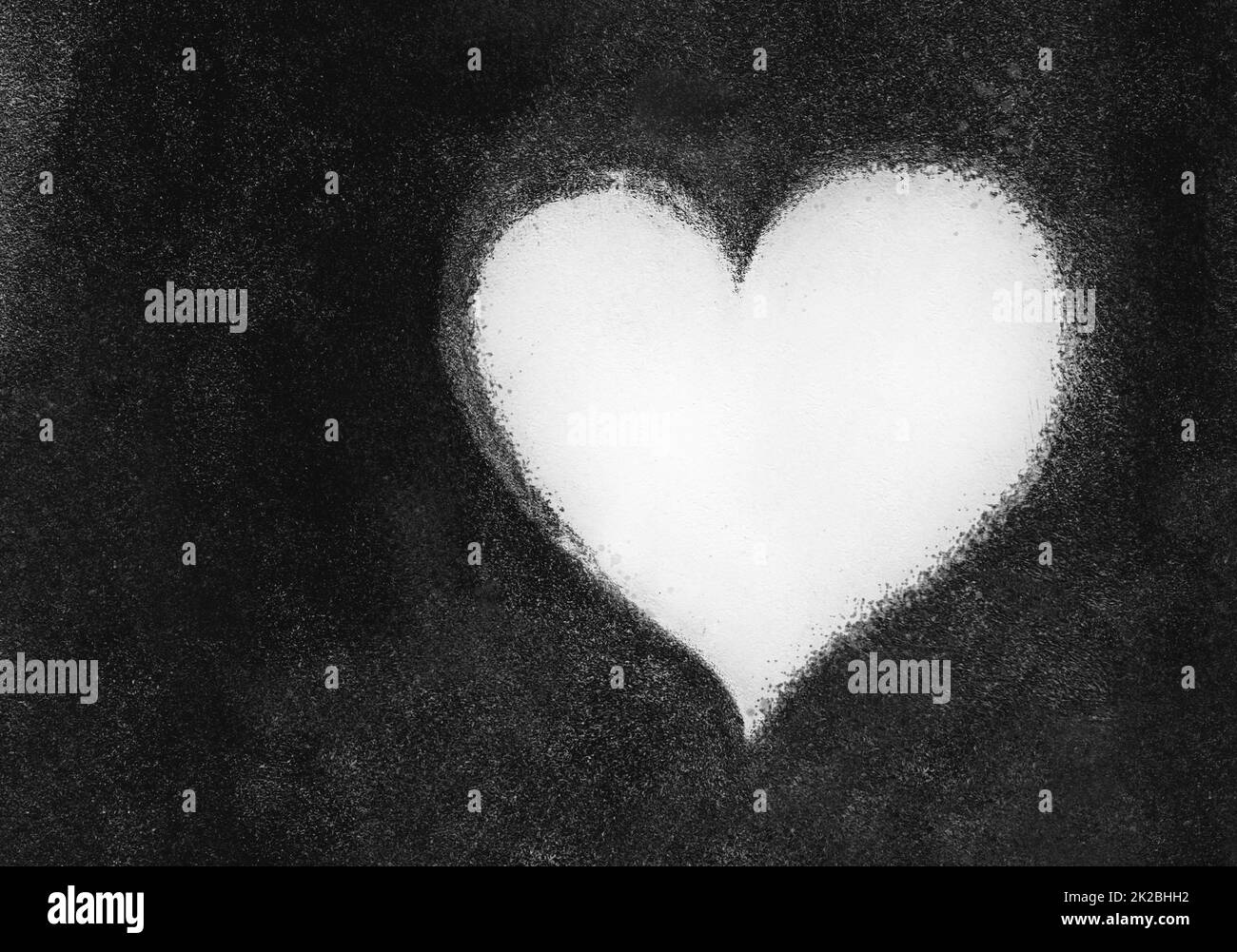 Cuore bianco su parete di cemento Foto Stock