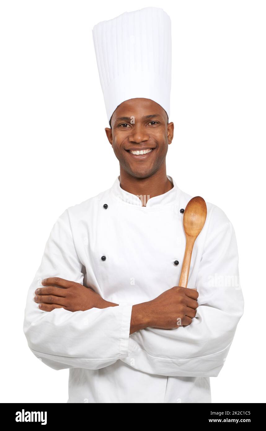 HES pronto per cucinare. Uno chef africano che tiene utensili da cucina. Foto Stock