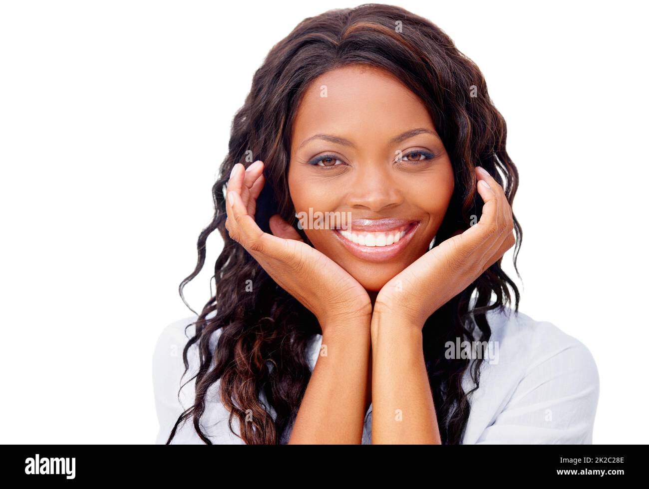 Rilassato e facile da usare. Vista croppata di una graziosa donna afroamericana sorridente. Foto Stock