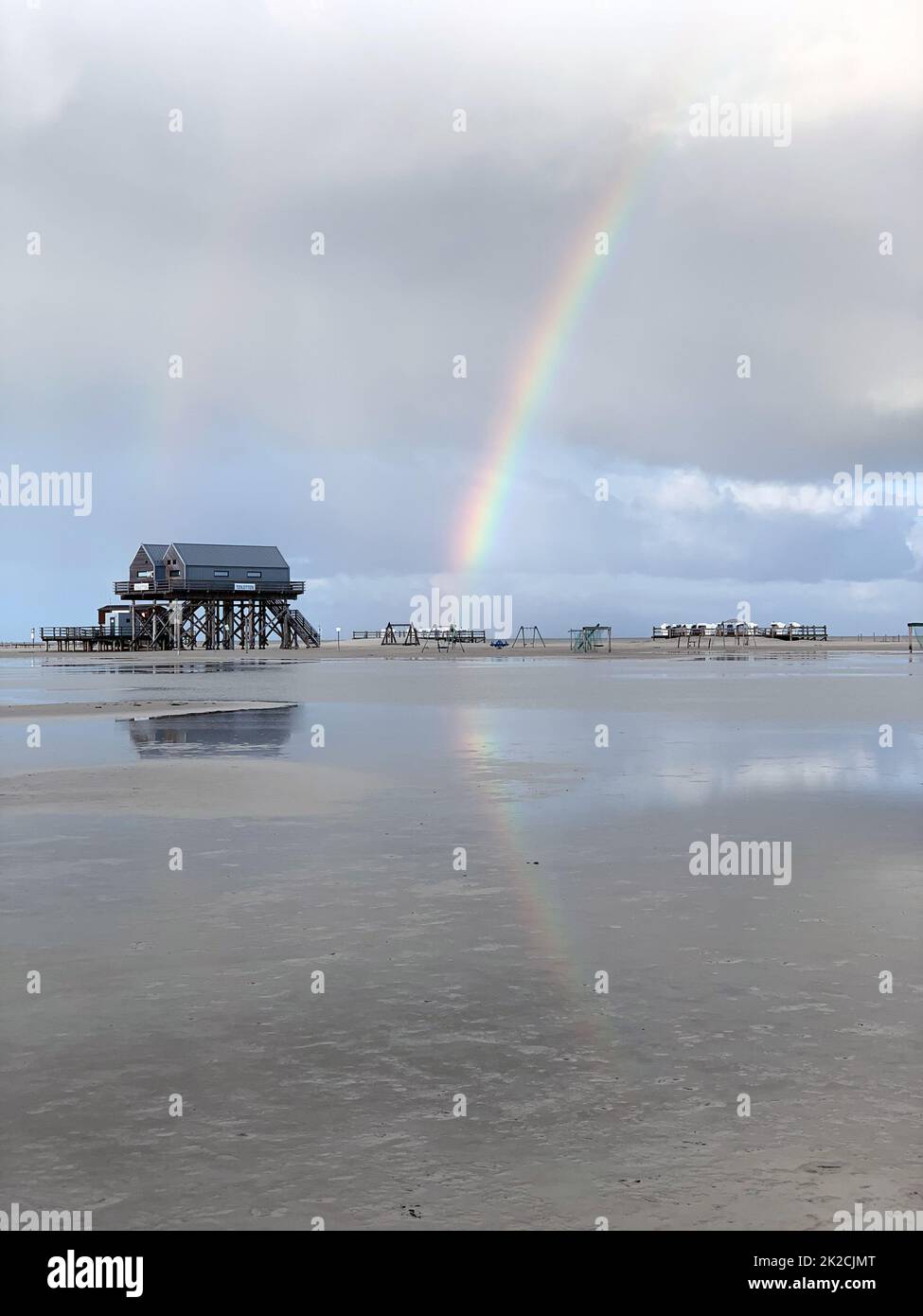 Case pile in san pietro ording con arcobaleno Foto Stock