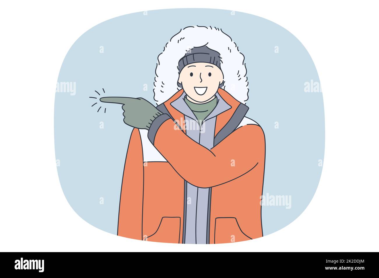 Uomo sorridente nella direzione del punto di outerwear Foto Stock