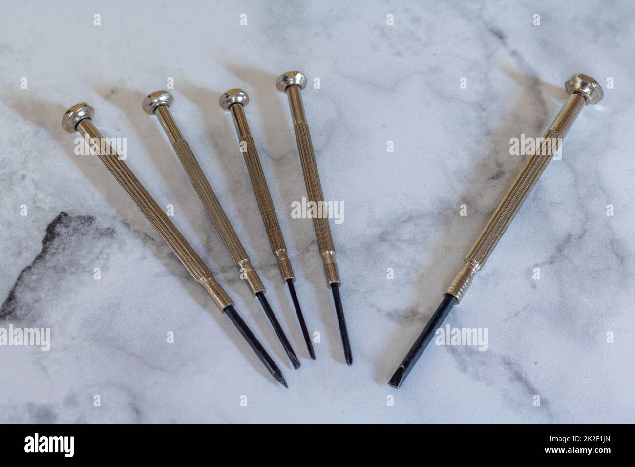 Mini cacciaviti diversi per orologiera Foto Stock