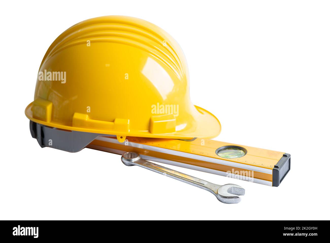 Casco da costruzione e strumenti per progetti di ingegneria su sfondo bianco. Foto Stock