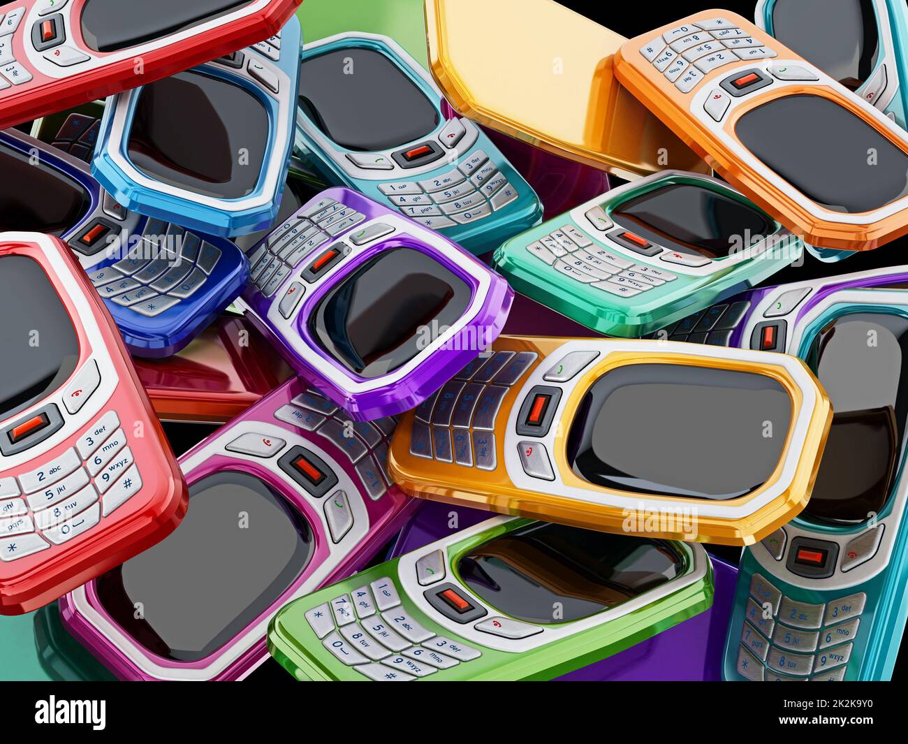 Telefoni cellulari multicolore di vecchio stile con tastiera. Illustrazione 3D Foto Stock