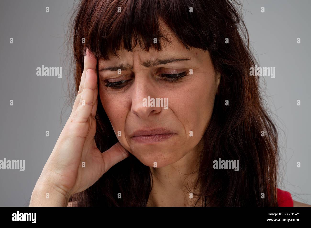 Malata donna con emicrania Foto Stock