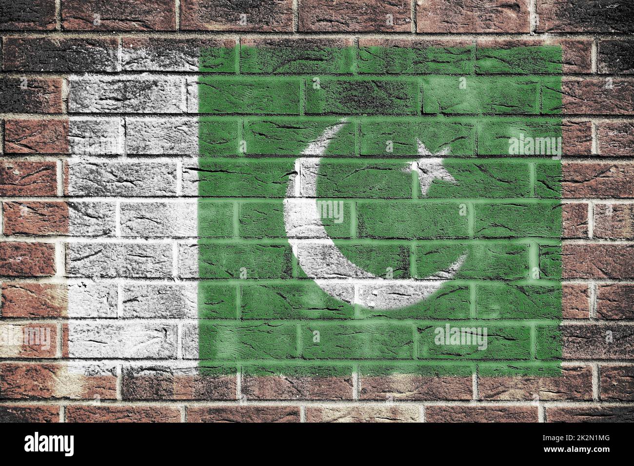 Bandiera del Pakistan sullo sfondo vecchio muro di mattoni Foto Stock