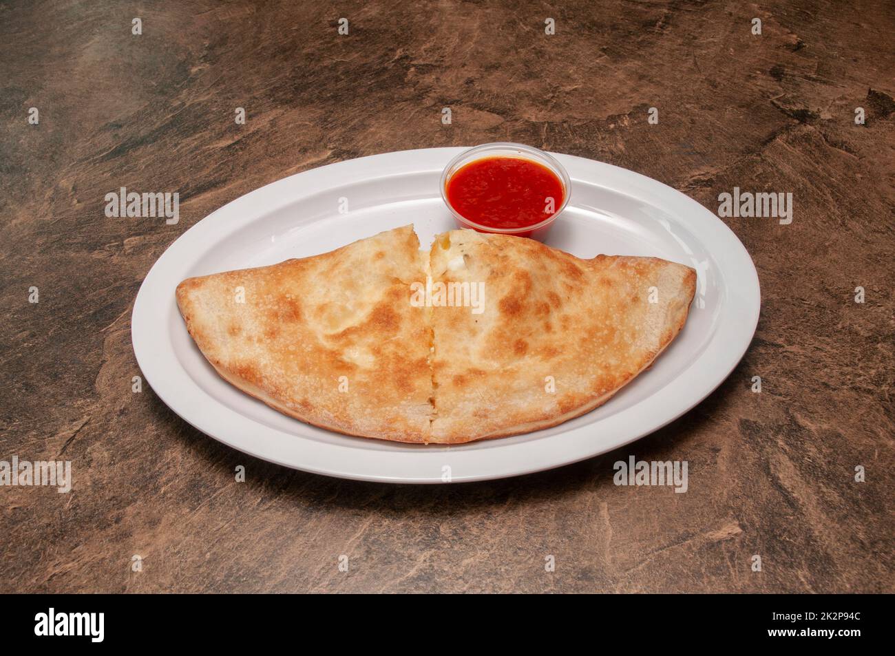 Delizioso calzone italiano Foto Stock