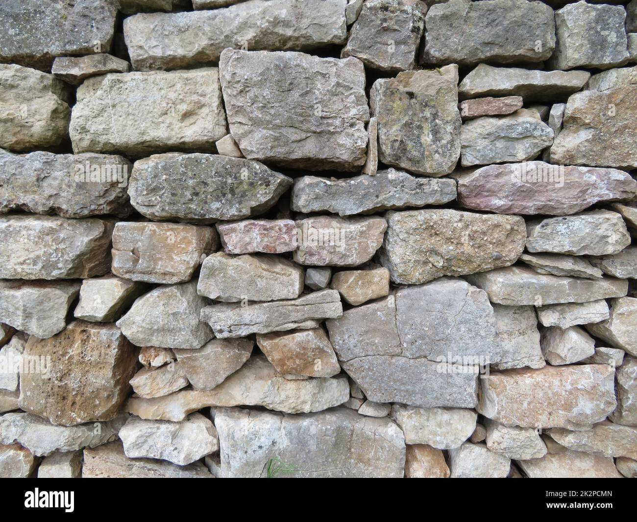 muro di pietra architettura antica grande durevole robusta artigianale Foto Stock