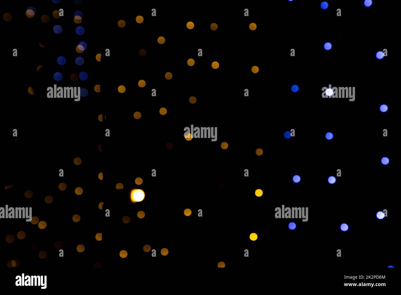 Sfondo nero con effetti di luce dorati Foto Stock