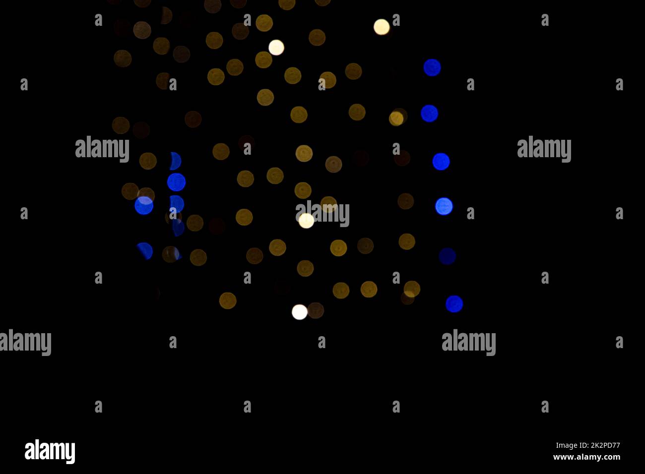 Sfondo nero con effetti di luce dorati Foto Stock