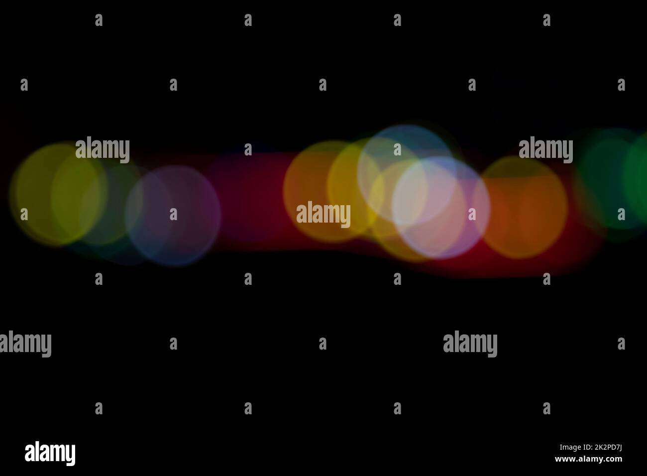 Sfondo nero con effetti di luce colorati Foto Stock