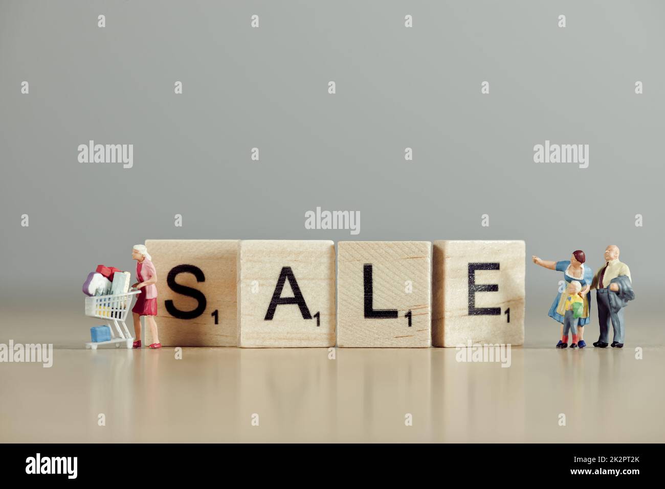 Parola 'ale' scritto con piastrelle di legno Foto Stock