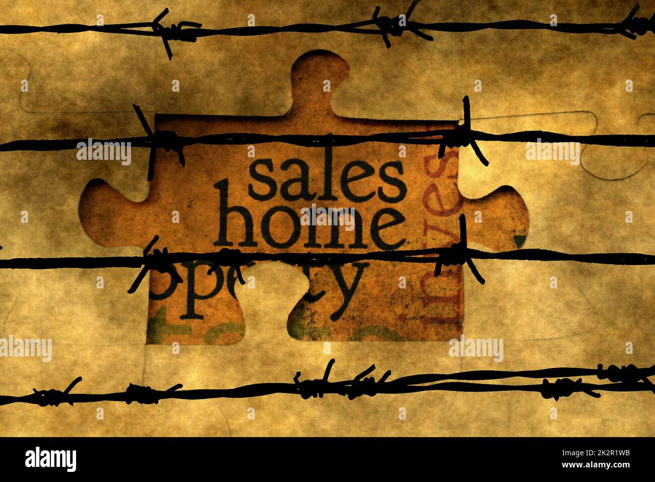 Vendite home concetto di puzzle contro barbwire Foto Stock