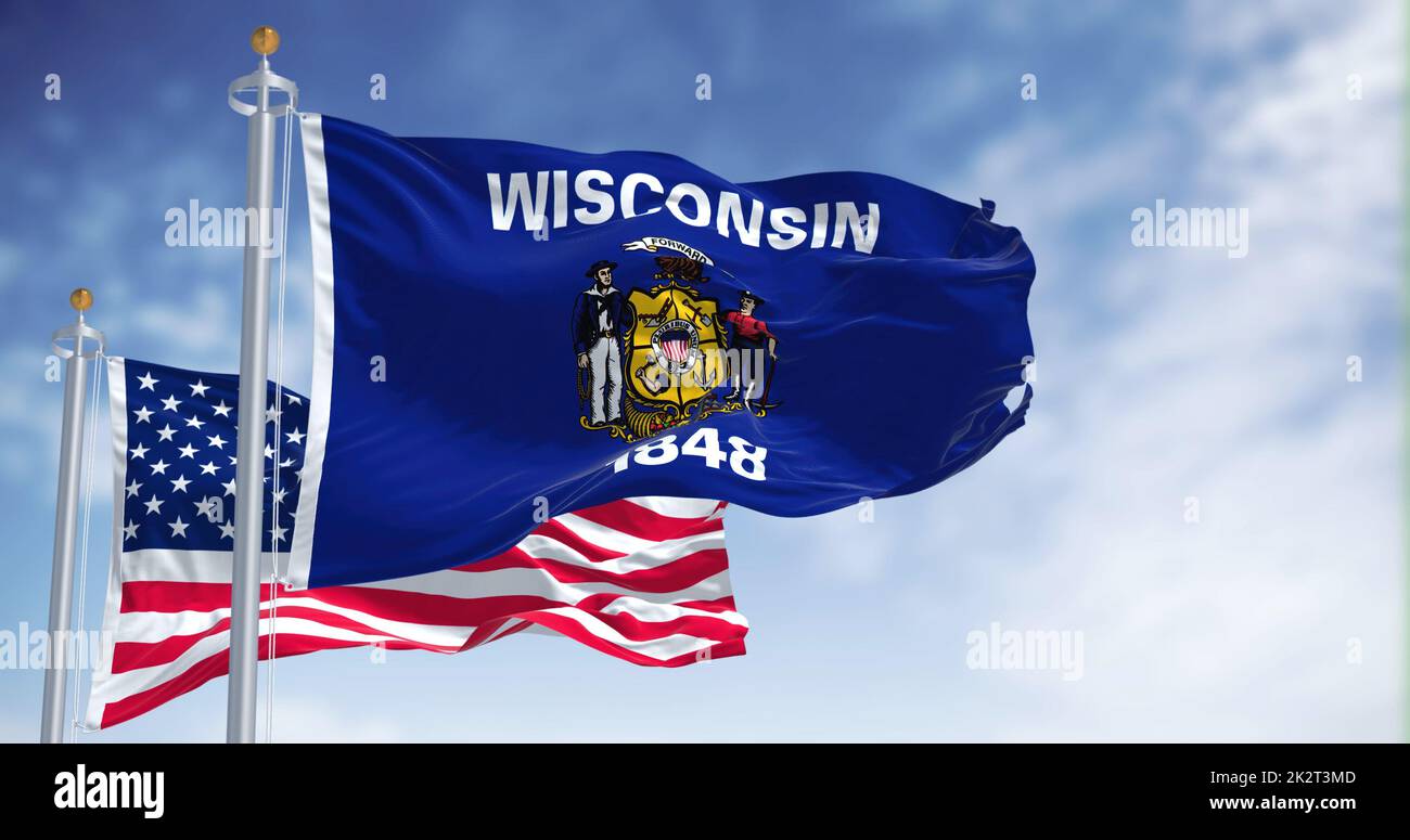 La bandiera dello stato del Wisconsin che sventola insieme alla bandiera nazionale degli Stati Uniti d'America Foto Stock
