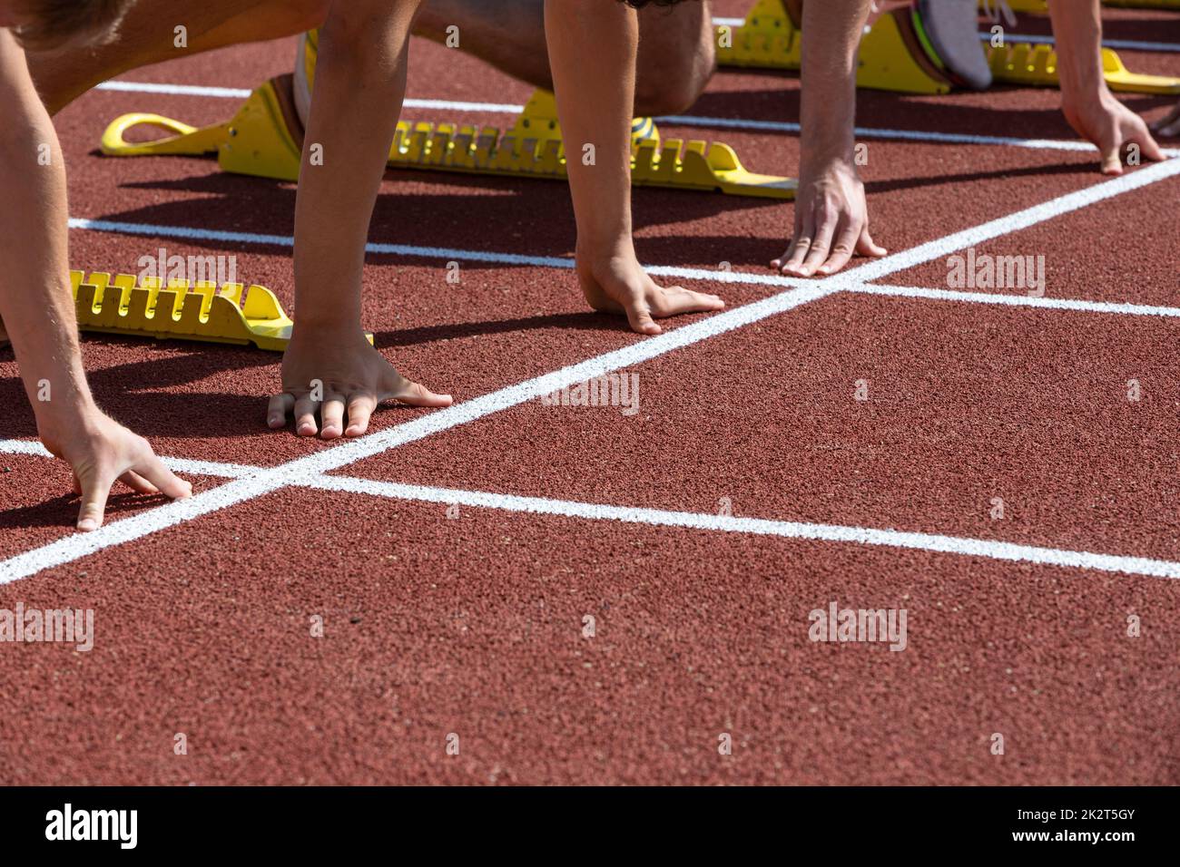 dita sulla linea di partenza in sprint Foto Stock