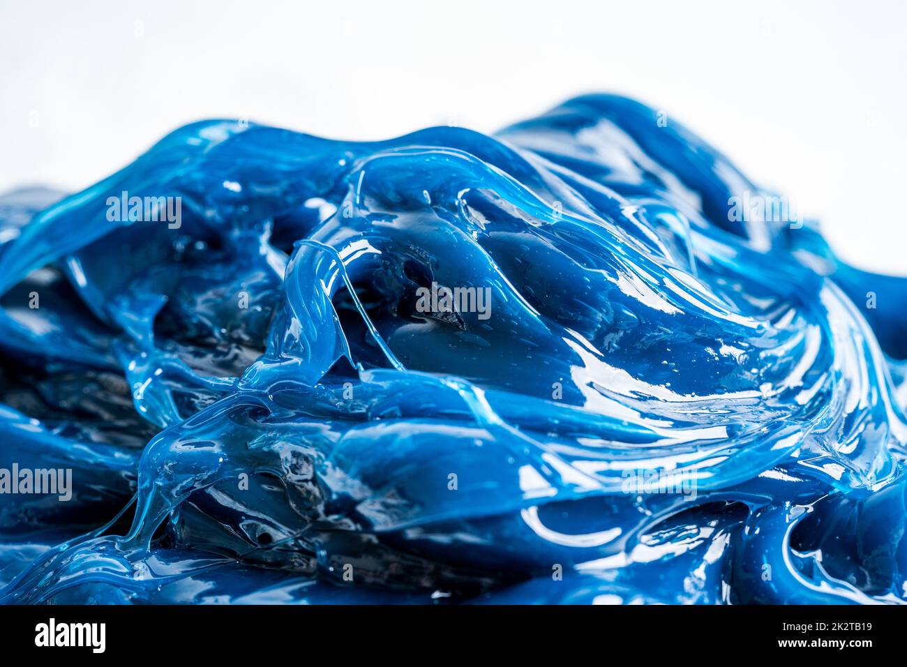 Grasso sintetico al litio complesso di alta qualità blu, alte temperature e lubrificazione di macchinari per uso automobilistico e industriale. Foto Stock