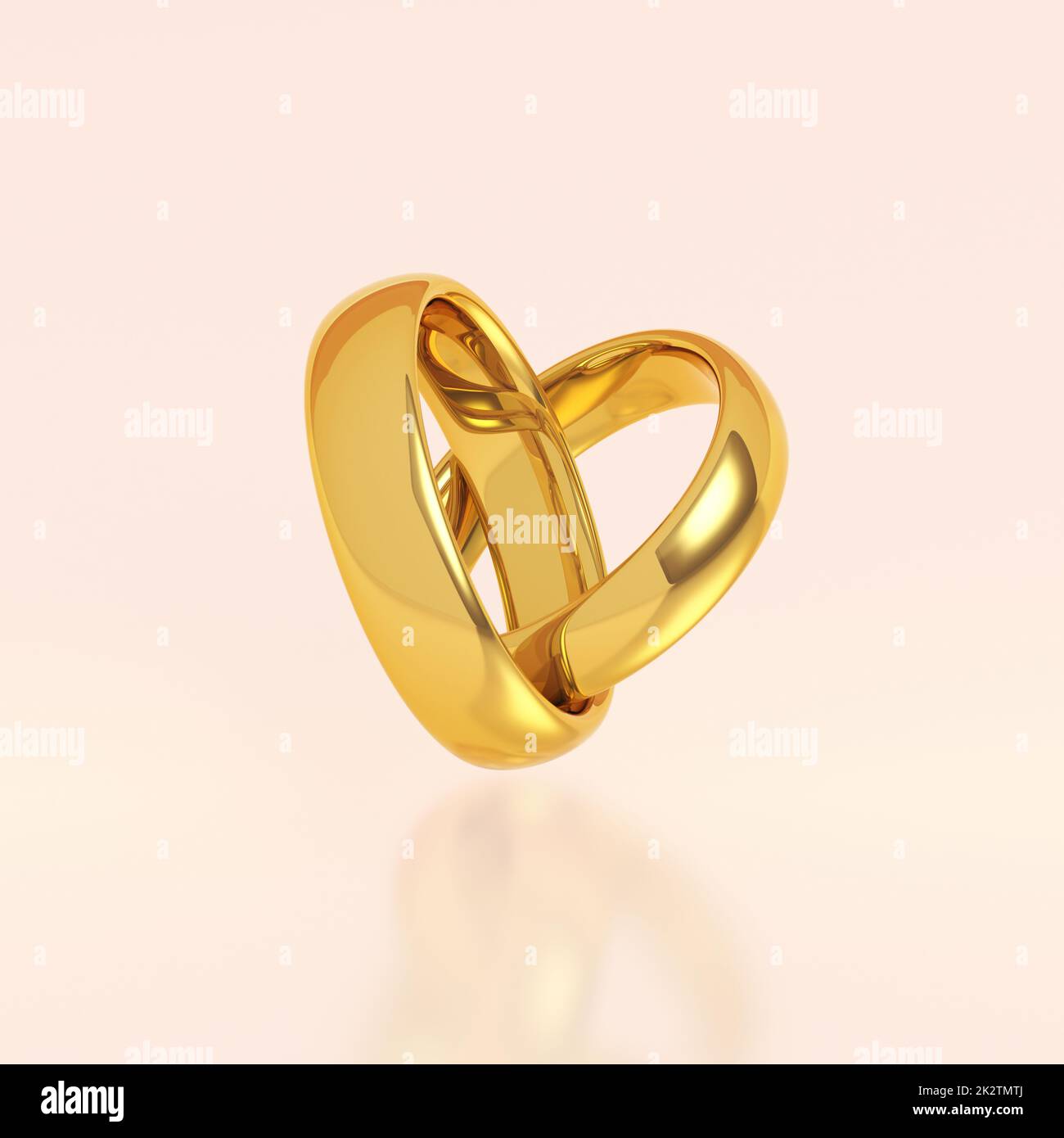 Due golden gli anelli di nozze Foto Stock