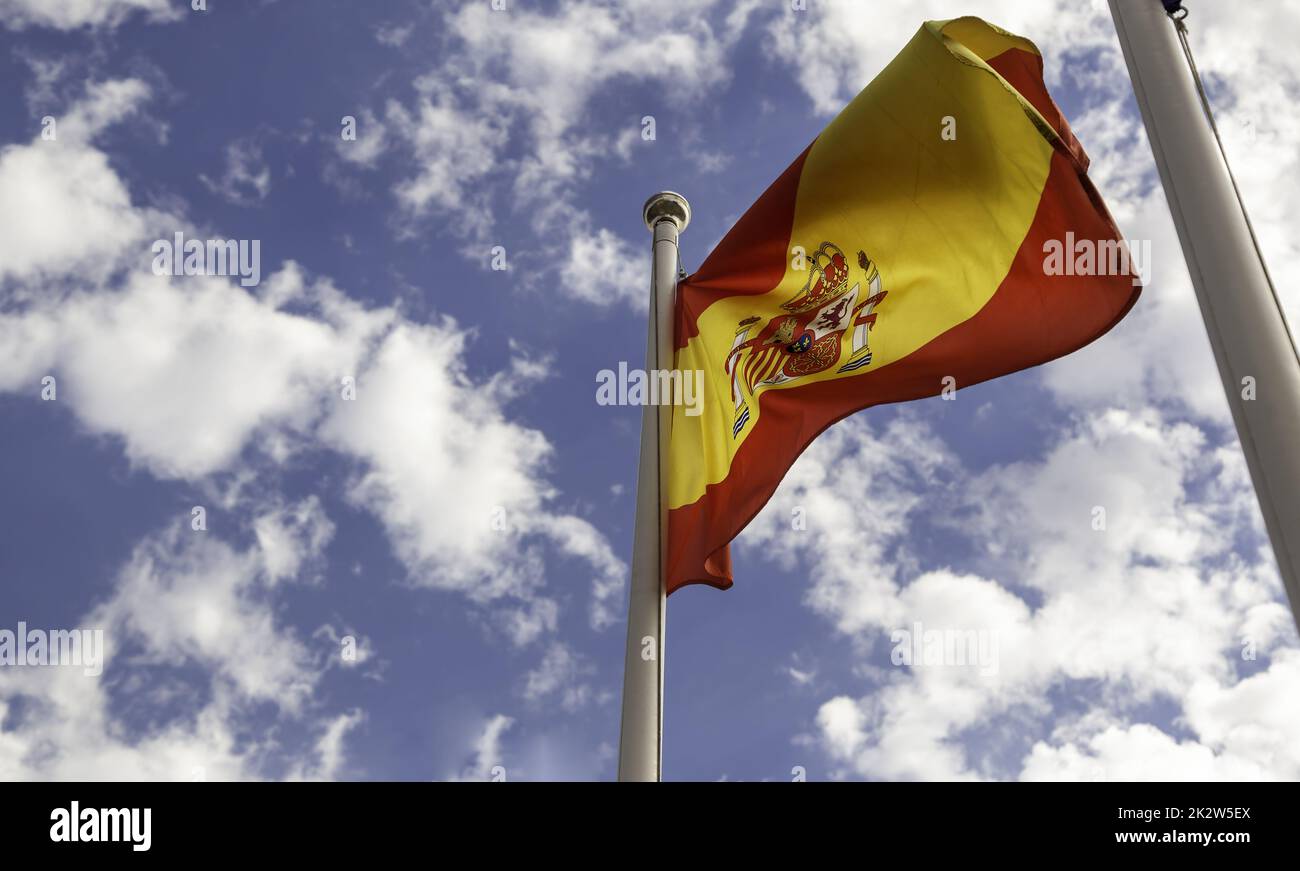 Bandiera spagnola nel vento Foto Stock