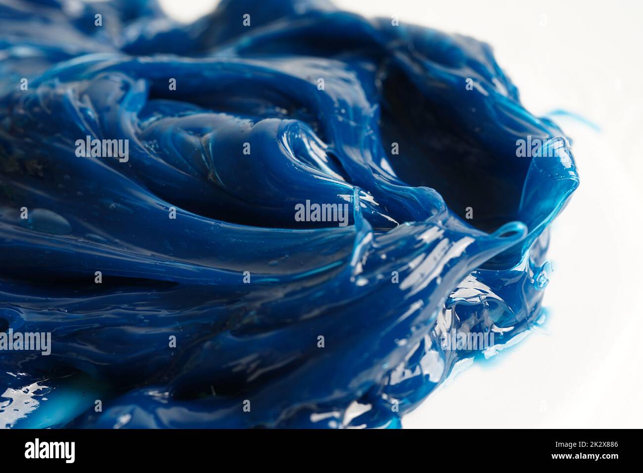Grasso, grasso sintetico al litio complesso di alta qualità blu, alta temperatura e lubrificazione di macchinari per il settore automobilistico e industriale. Foto Stock