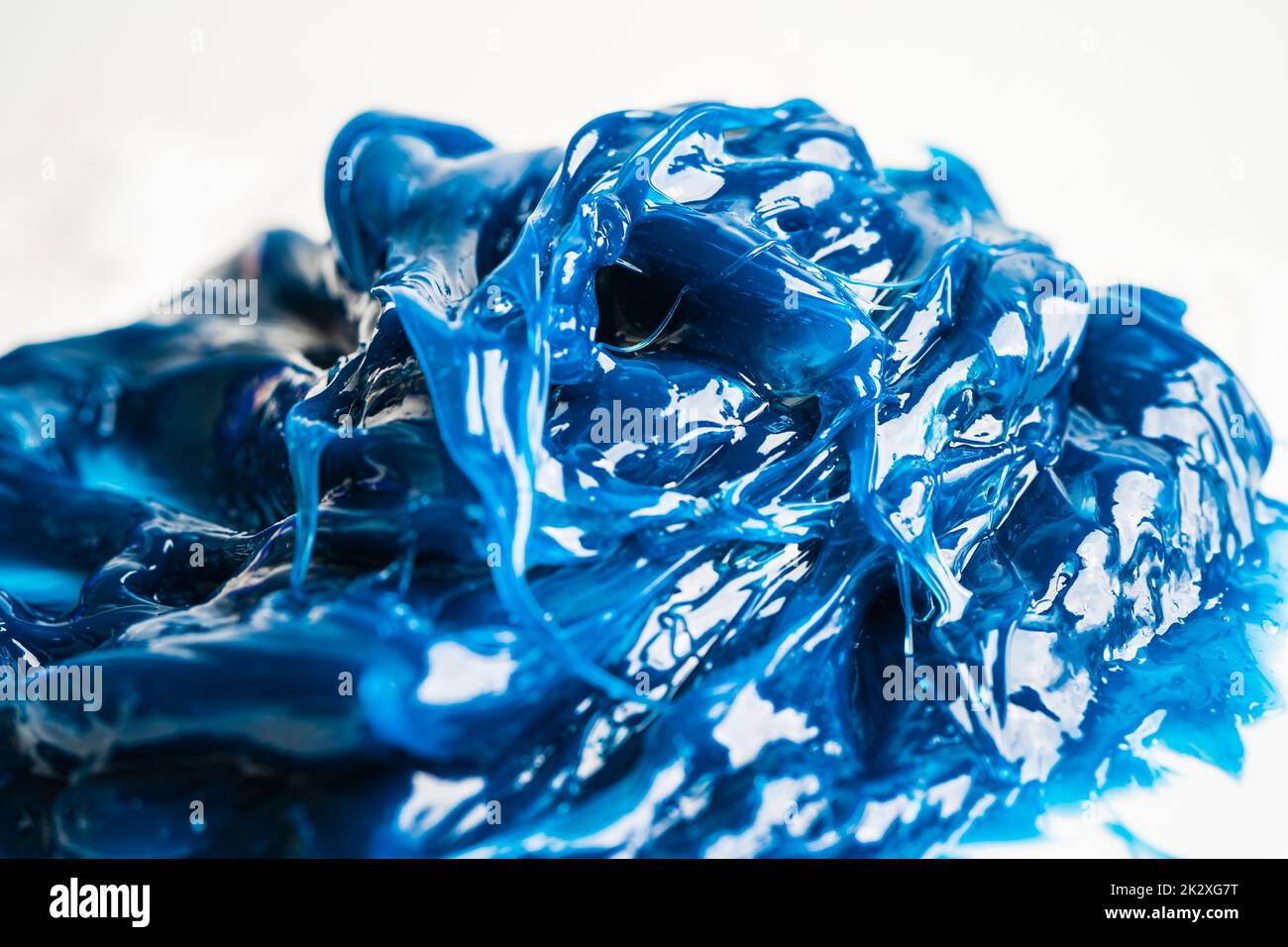 Grasso sintetico al litio complesso di alta qualità blu, alte temperature e lubrificazione di macchinari per uso automobilistico e industriale. Foto Stock
