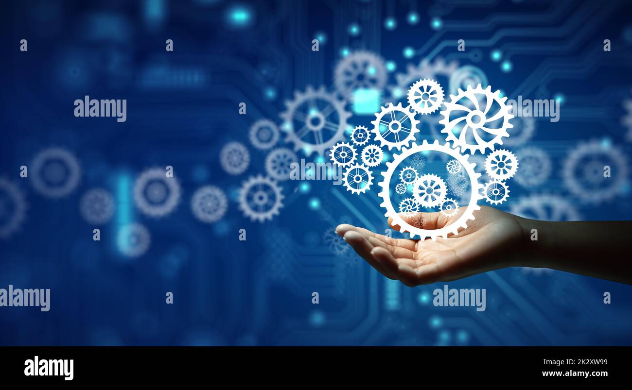 Ruote dentate con supporto manuale. Idea di business, lavoro di squadra, strategia di piallatura, cooperazione, soluzione di analisi. Foto Stock