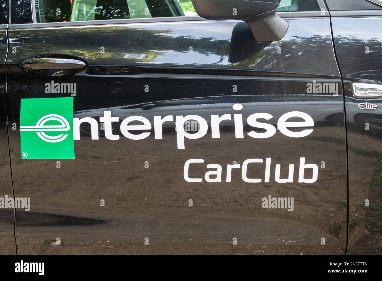 Logo Enterprise car club su veicolo nero o auto, alternativa all'acquisto di auto Foto Stock