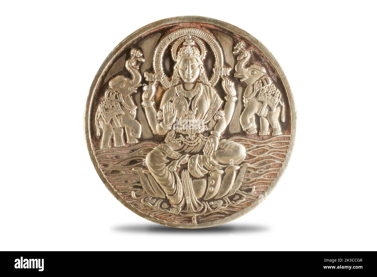 Moneta d'argento Durga, Saraswati o laxmi isolata su sfondo bianco . Dio indiaan. Foto Stock