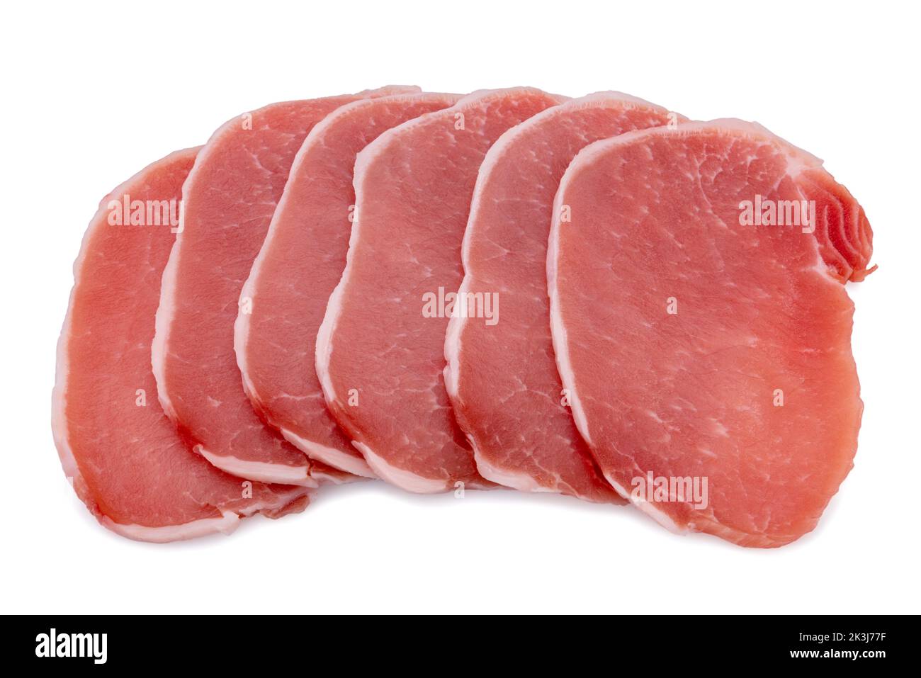 Bistecche di lombo di maiale crudo, fette isolate su bianco, percorso di taglio Foto Stock