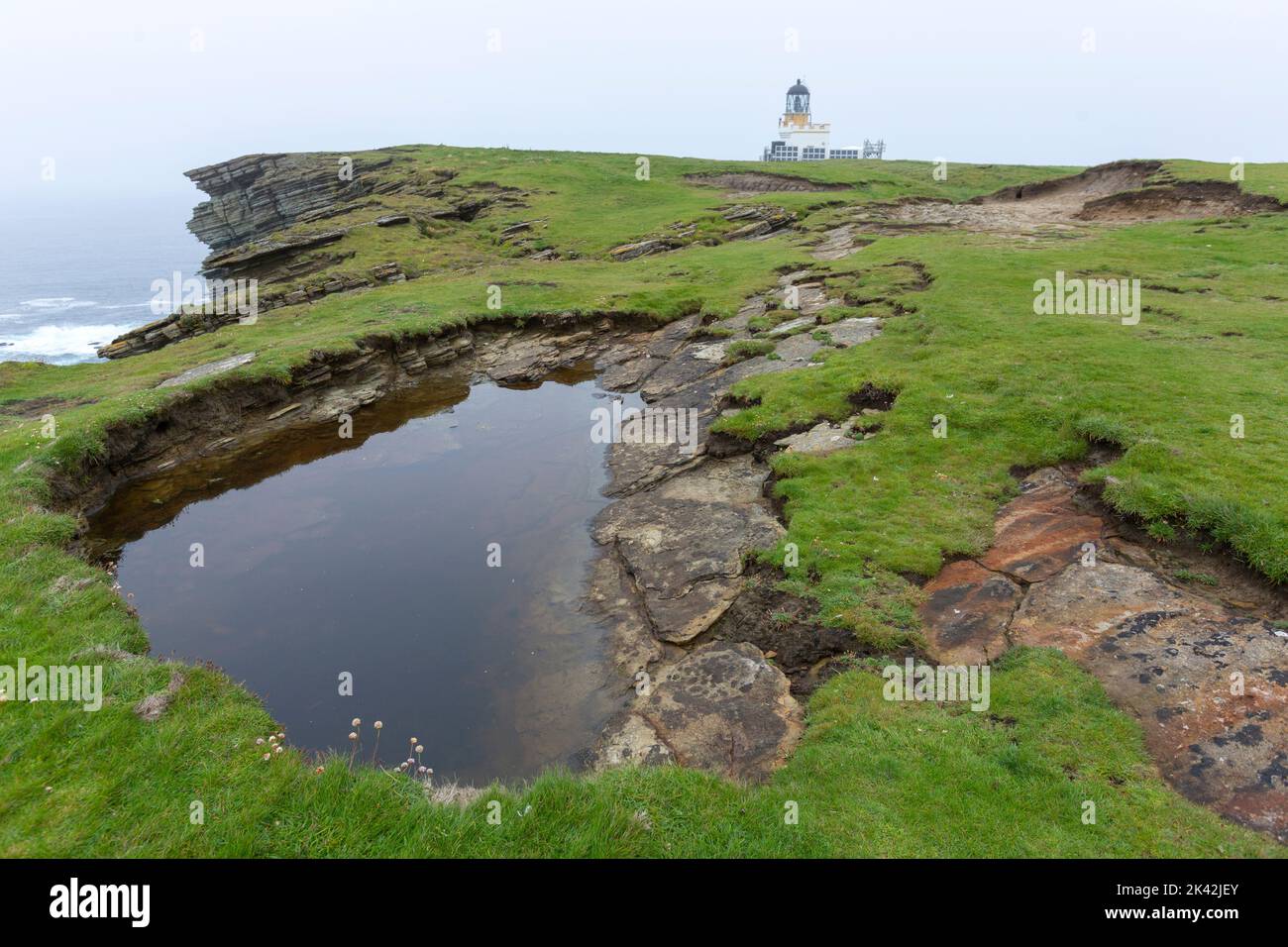 Faro a Brough di Birsay, il continente di Orkney, Scozia, Regno Unito Foto Stock