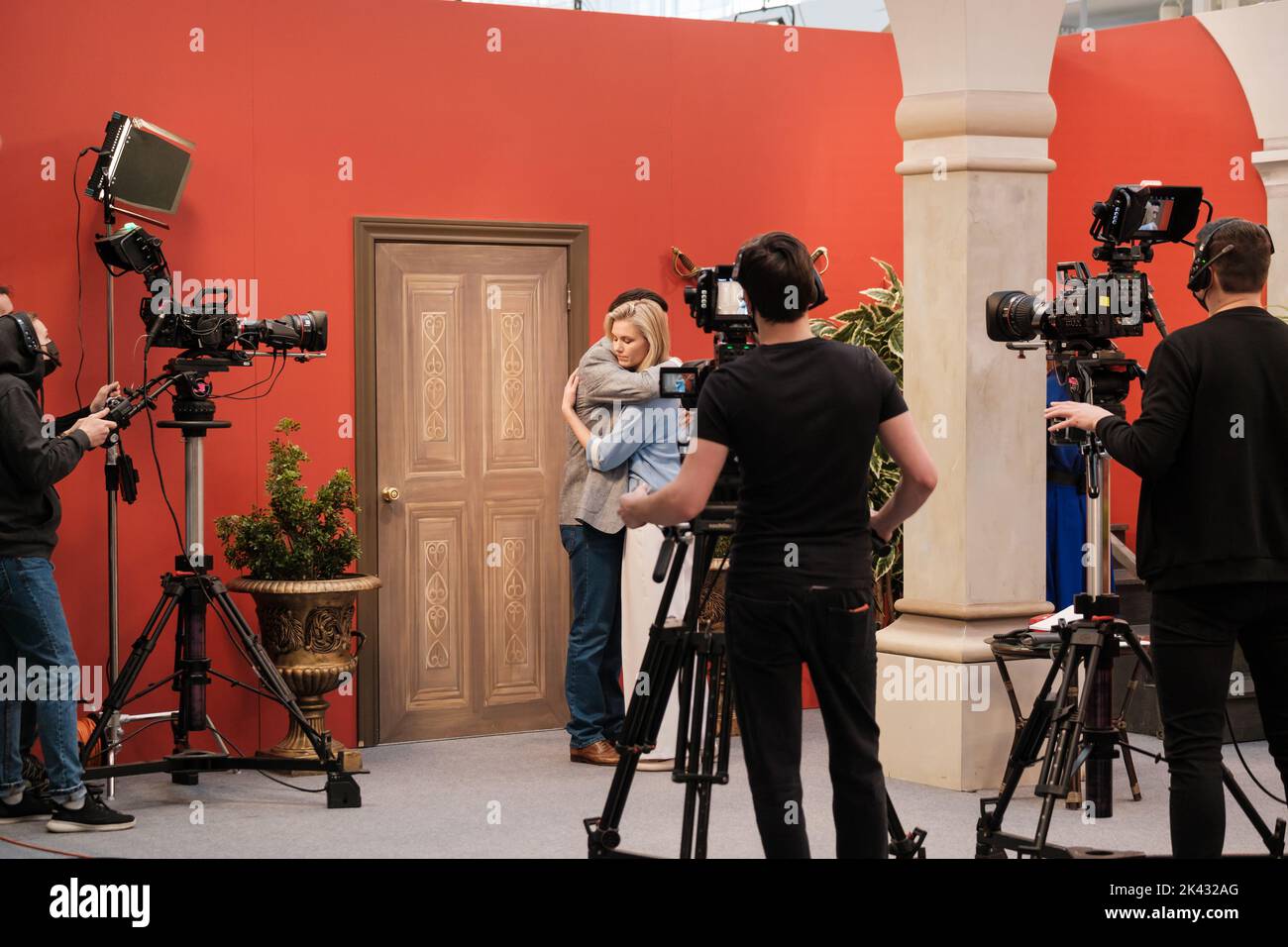 Filmmaking troupe scena di ripresa per film Foto Stock