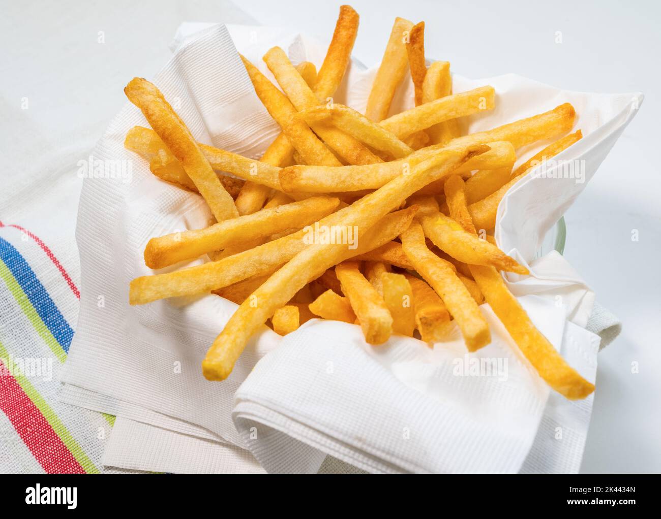 Patatine fritte su tovaglioli Foto Stock