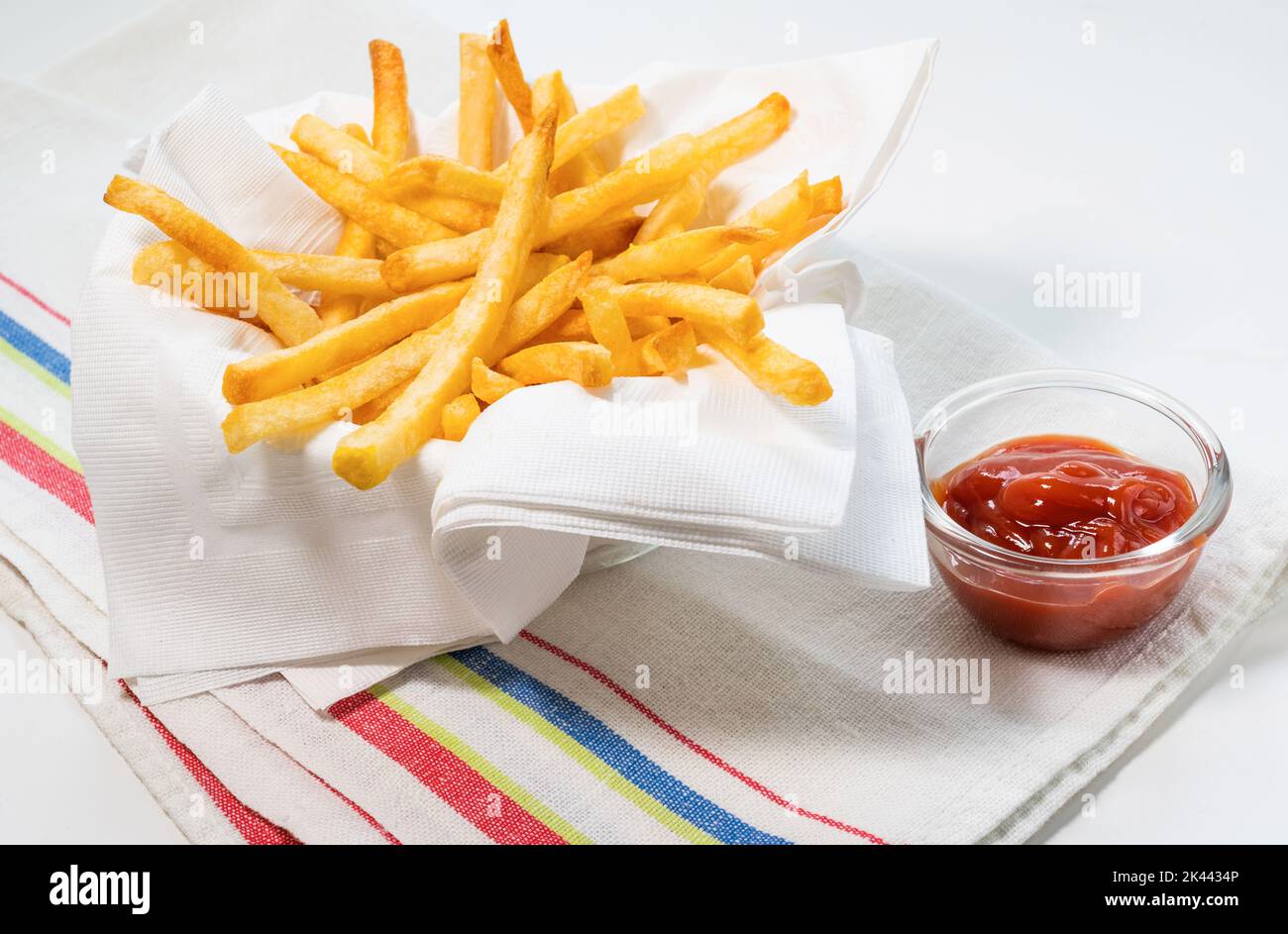 Patatine fritte con tazza di ketchup Foto Stock