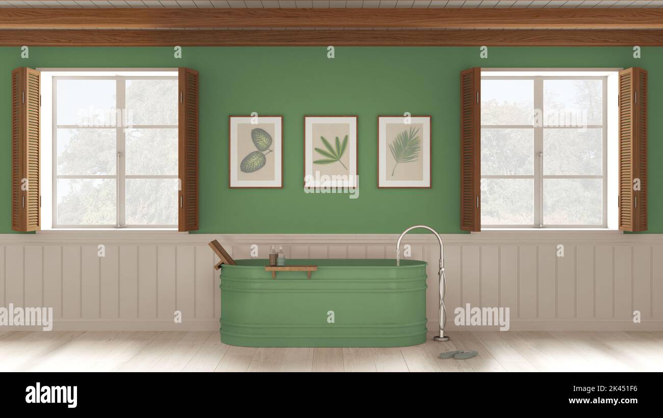 Bagno romantico con vasca autoportante nei toni del bianco e del verde. Due finestre panoramiche con persiane in legno e soffitto a travi. Parquet, Foto Stock