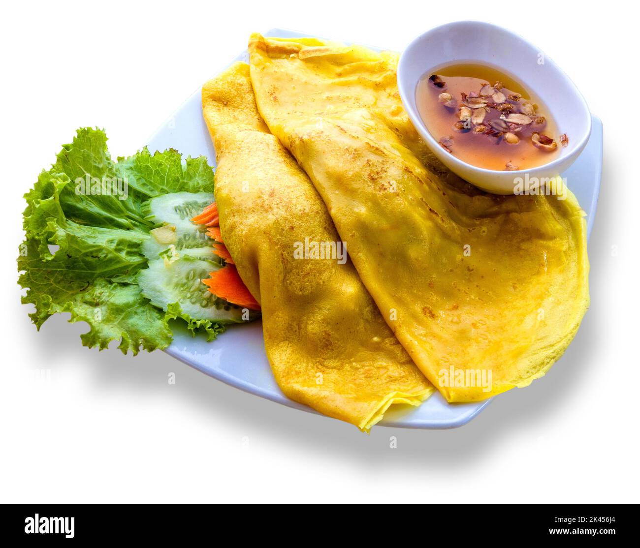 Cambogiano stile Khmer frittelle con cioccolato che i turisti e la gente del posto mangiano a Siem Reap. Foto Stock