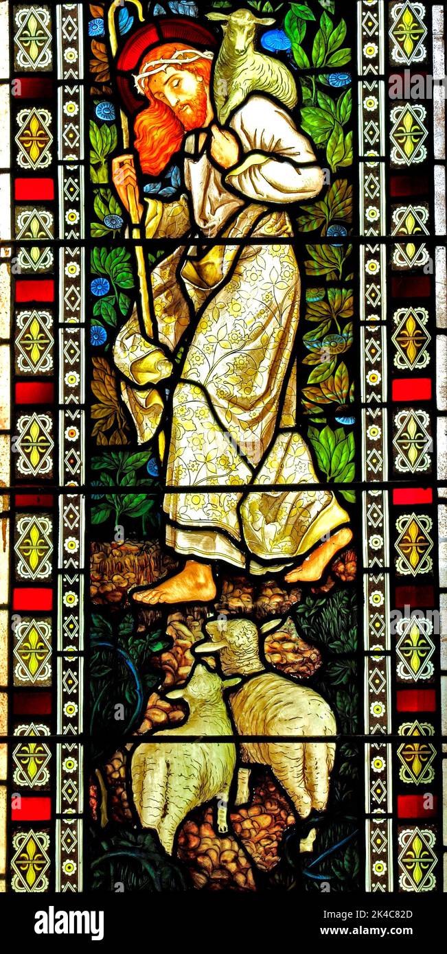 Egli deve raccogliere gli agnelli nel suo braccio, Gesù, con la corona di spine, vetrate da J. Powell & Figlio, 1878, Houghton St. Giles, Norfolk, Inghilterra, Regno Unito Foto Stock