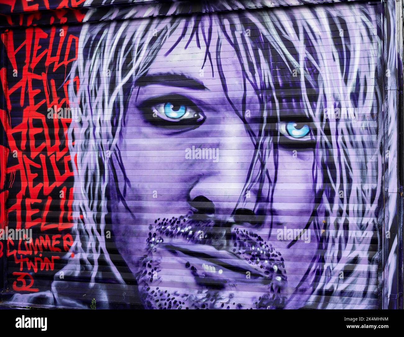 Graffiti ritratto di Kurt Cobain di Glimmer Twin 32 in Trafalgar Lane, zona Nord Laines di Brighton Foto Stock