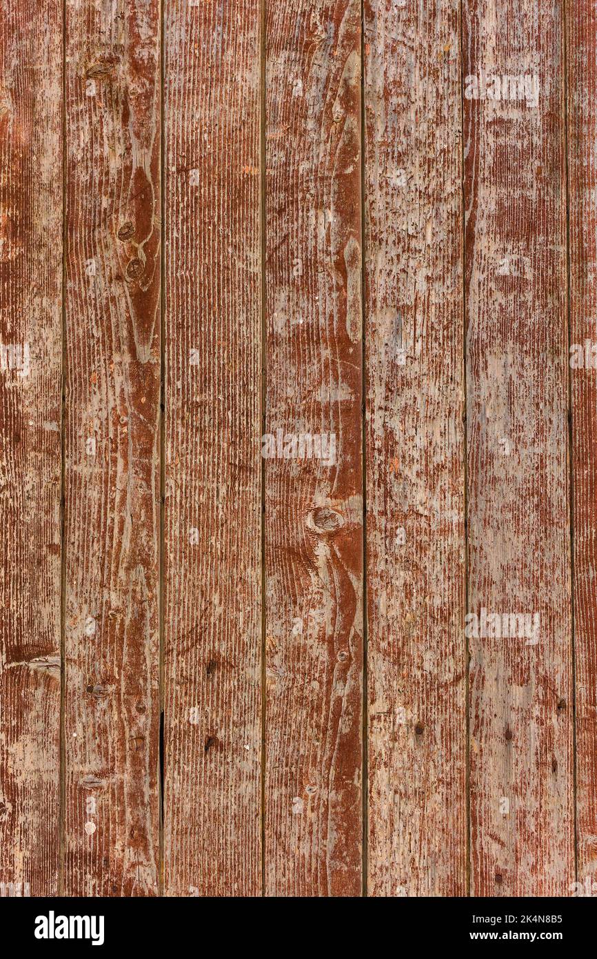 Vista ravvicinata dello sfondo rustico in legno di colore rosso Foto Stock
