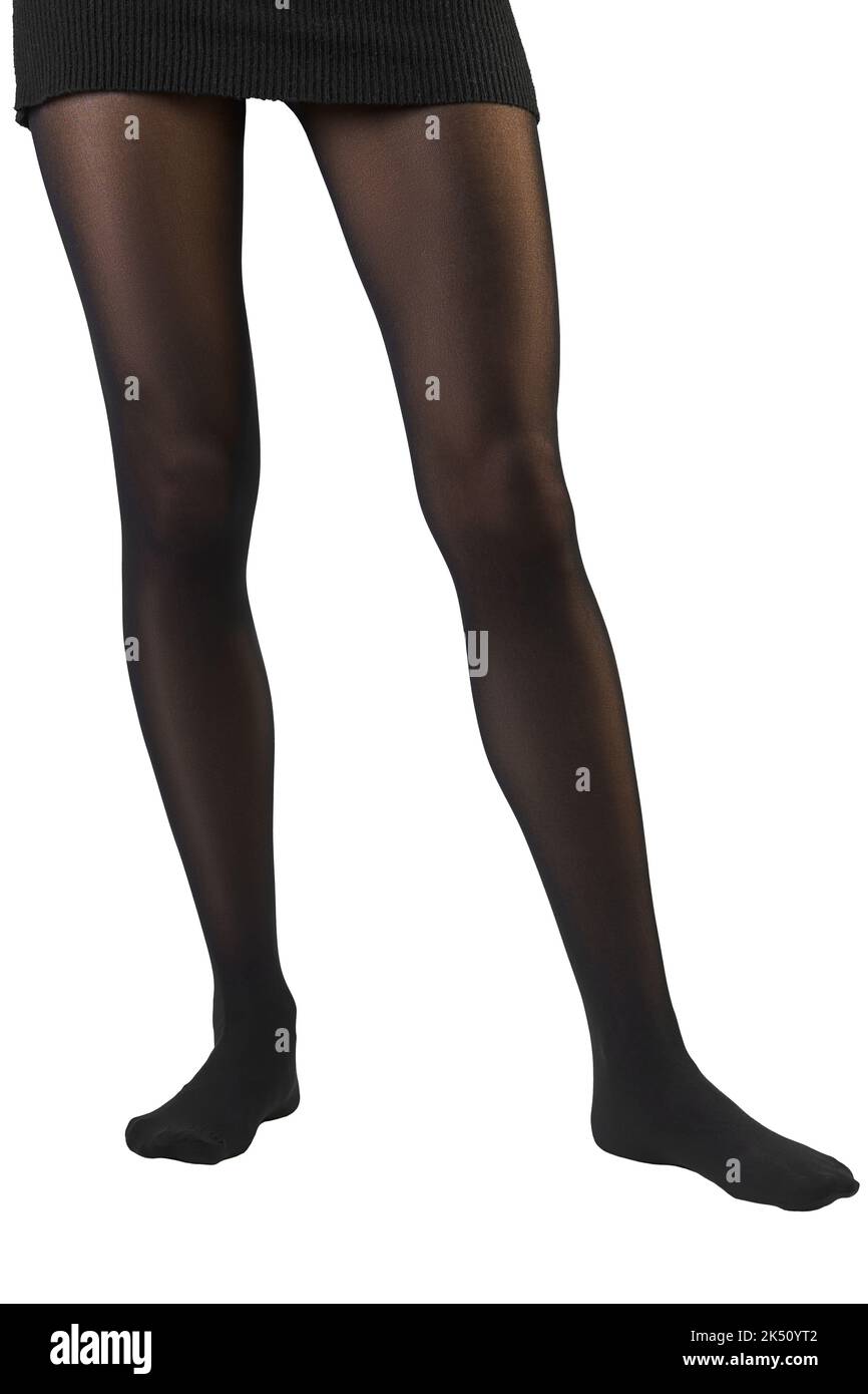 Gambe femminili sottili in collant nero stretto con effetto stringente Foto Stock