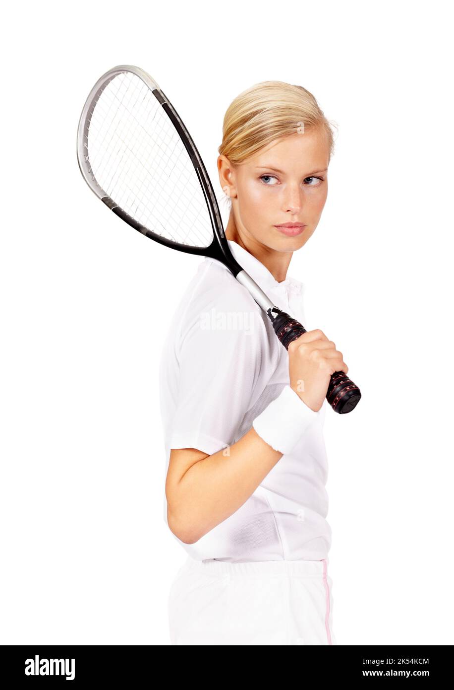 Ceneri che scouting l'opposizione. Una donna dall'aspetto sicuro che tiene la racchetta da squash. Foto Stock