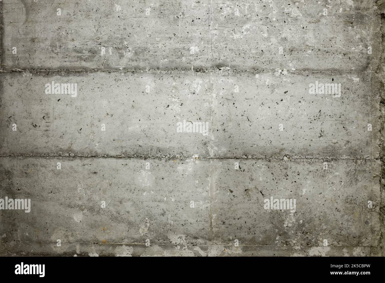 Parete di cemento esposta grigia come sfondo Foto Stock