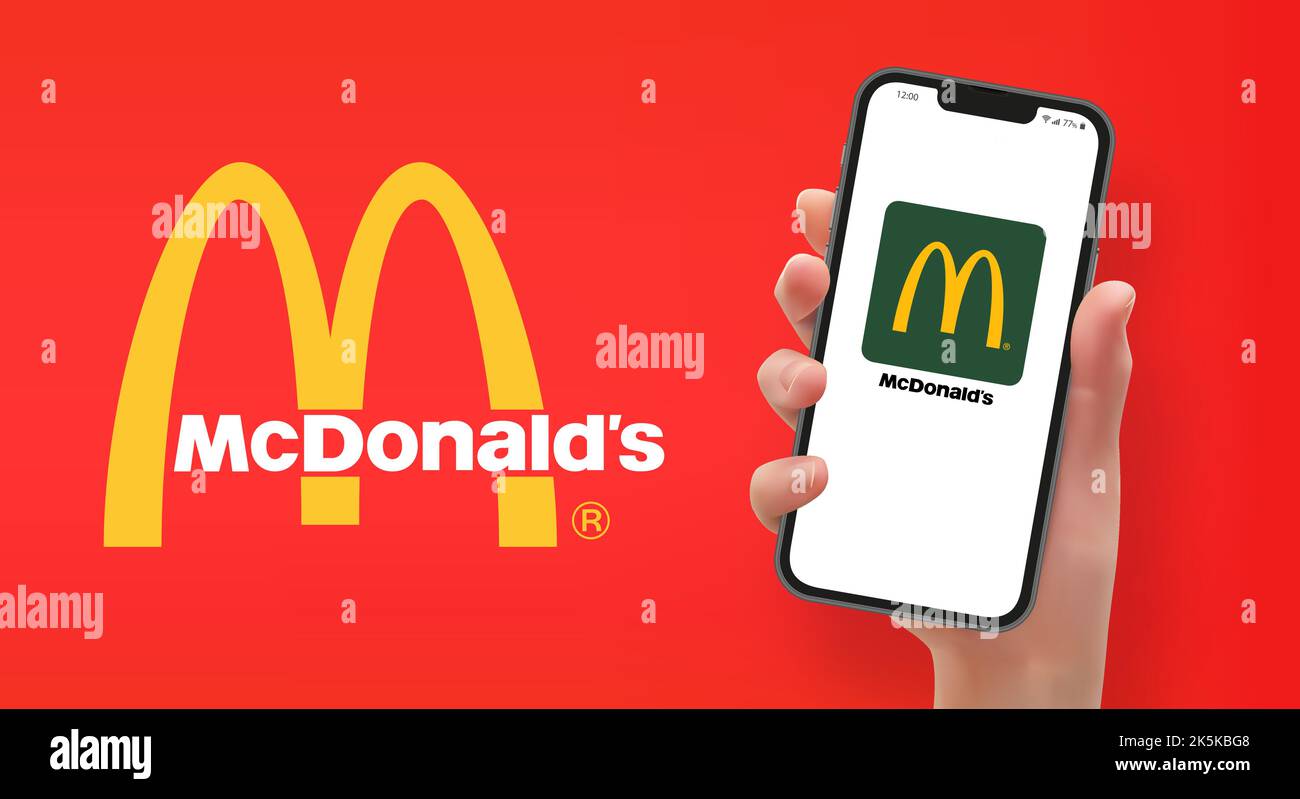 Donna che tiene lo smartphone con il logo McDonald's, in formato vettoriale Illustrazione Vettoriale