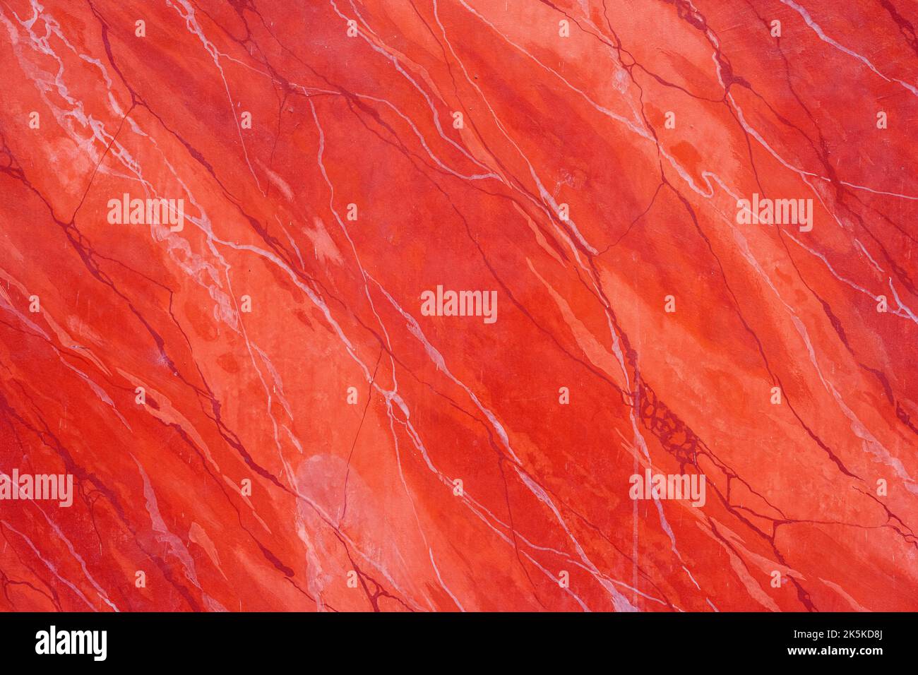 Sfondo da una parete in marmo rosso Foto Stock