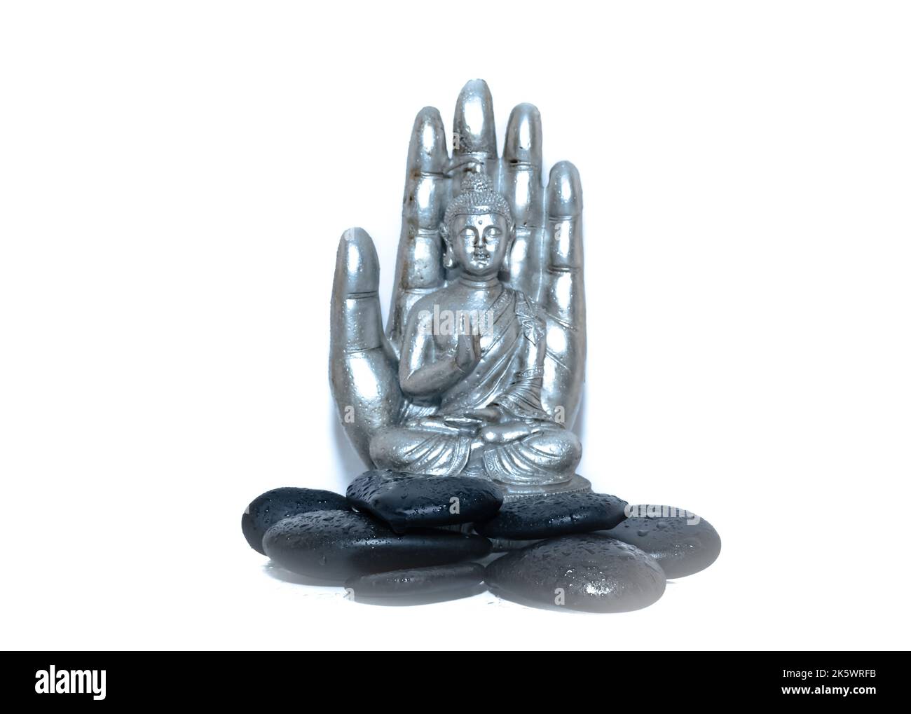 Statua di Buddha su sfondo bianco. Foto Stock